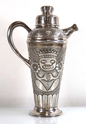 Lot 226 - A metalware cocktail shaker decorated with...