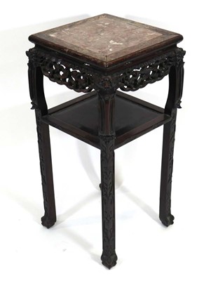 Lot 2 - A Chinese Export hardwood two-tier side table...