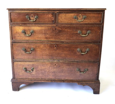 Lot 3 - A George III oak chest of two short over three...