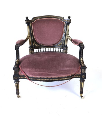 Lot 5 - A late 19th century ebonised and gilded...