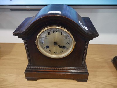 Lot 1057 - Dark oak cased mantle clock