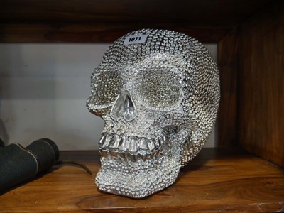 Lot 1071 - Diamante silver coloured scull