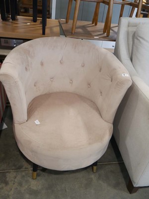 Lot 1079 - Light pink button back upholstered tub style...