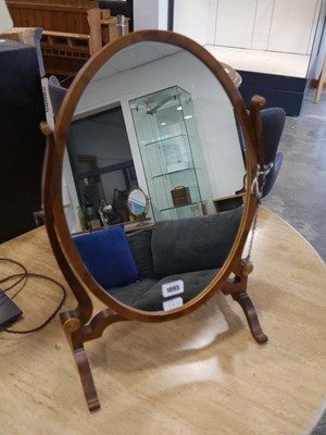 Lot 1095 - Yew framed oval mirror