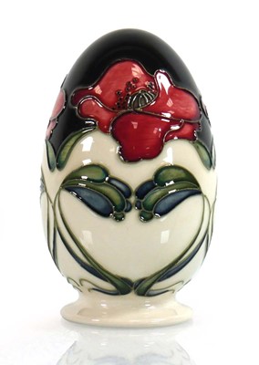 Lot 164 - A Moorcroft egg ornament of ovoid form...