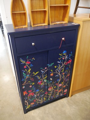 Lot 1104 - A storage cupboard with upper drawer...