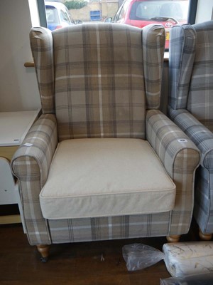 Lot 1037 - Modern wing back easy chair with check...