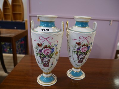 Lot 1174 - Pair of Minton bicentenary rose basket urn...