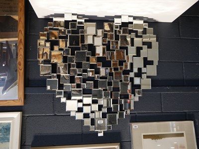 Lot 1179 - Wall mirror in the form of a heart constructed...