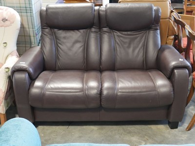 Lot 1133 - Modern brown leather upholstered 2 seater sofa