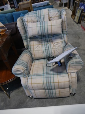 Lot 1134 - Check upholstered electric reclining wing back...