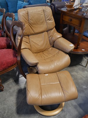 Lot 1138 - Tan leatherette upholstered "Stress Less" easy...