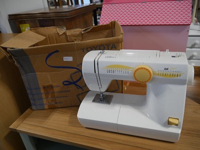 Lot 1198 - Boxed E&R Classic sewing machine by Toyota