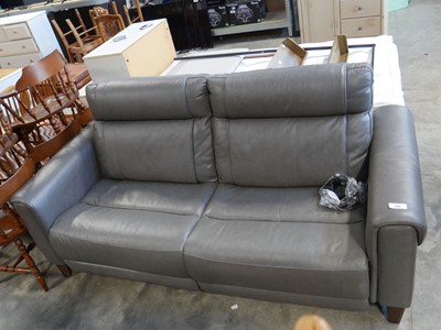 Lot 1151 - Grey leather upholstered electric reclining sofa