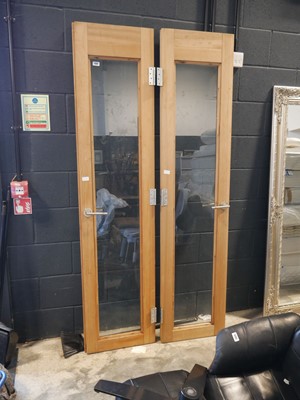 Lot 1168 - 2 slim glazed doors with furniture