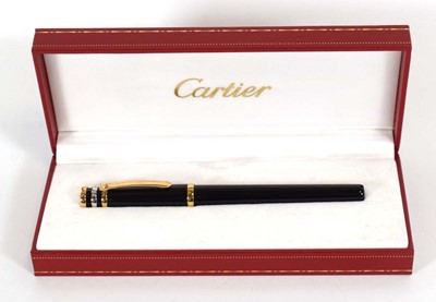 Lot 131 - A Cartier 'Three Gold' Trinity fountain pen in...