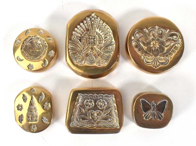 Lot 150 - A group of six brass jewellery moulds