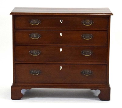 Lot 1 - An early 19th century mahogany chest of four...