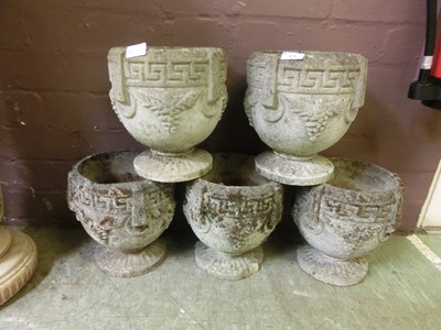 Lot 13 - A set of five garden pots with Greek key rim...
