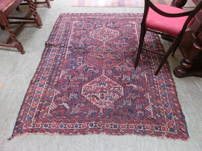 Lot 31 - A hand woven caucasian rug, the multi line...