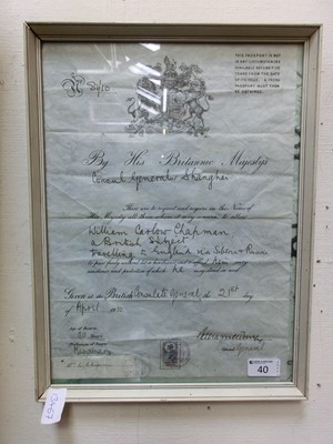 Lot 40 - A framed and glazed passport dated 1910 issued...