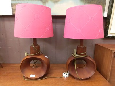 Lot 72 - A modern pair of wood effect table lamps with...