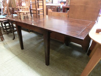 Lot 85 - A reproduction fold over extending dining table