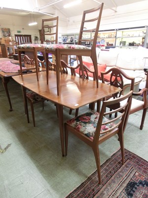 Lot 93 - A mid-20th century teak extending dining table...