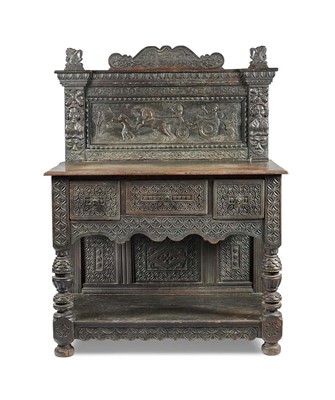 Lot 11 - A 19th century carved oak sideboard in the...