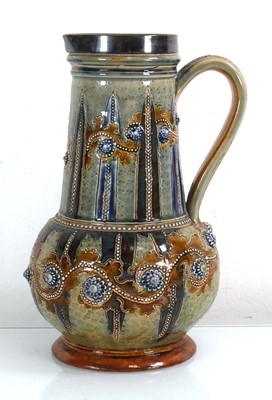 Lot 204 - A silver mounted Doulton Lambeth water jug...