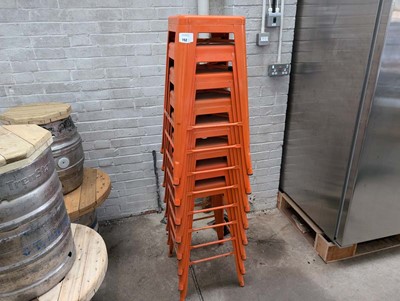 Lot 152 - Stack of 8 orange painted stools