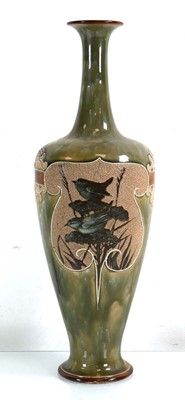 Lot 210 - A Doulton Lambeth bottle vase of slender form...