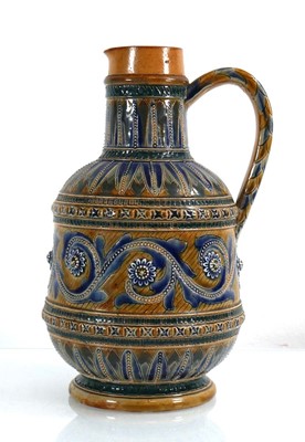 Lot 214 - A Doulton Lambeth water jug of mallet form...