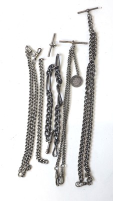 Lot 445 - A collection of silver and white metal albert...