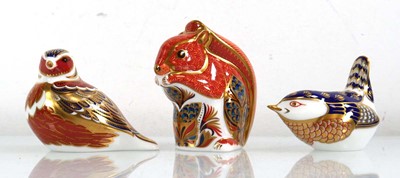 Lot 262 - Three Royal Crown Derby paperweights: robinm...