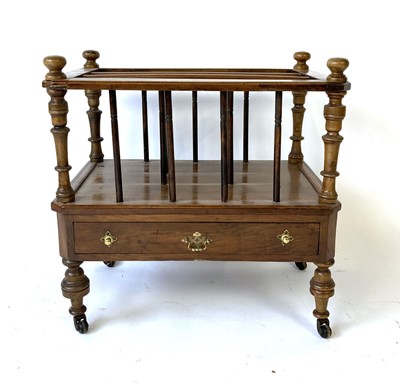 Lot 47 - A Victorian walnut and strung canterbury with...