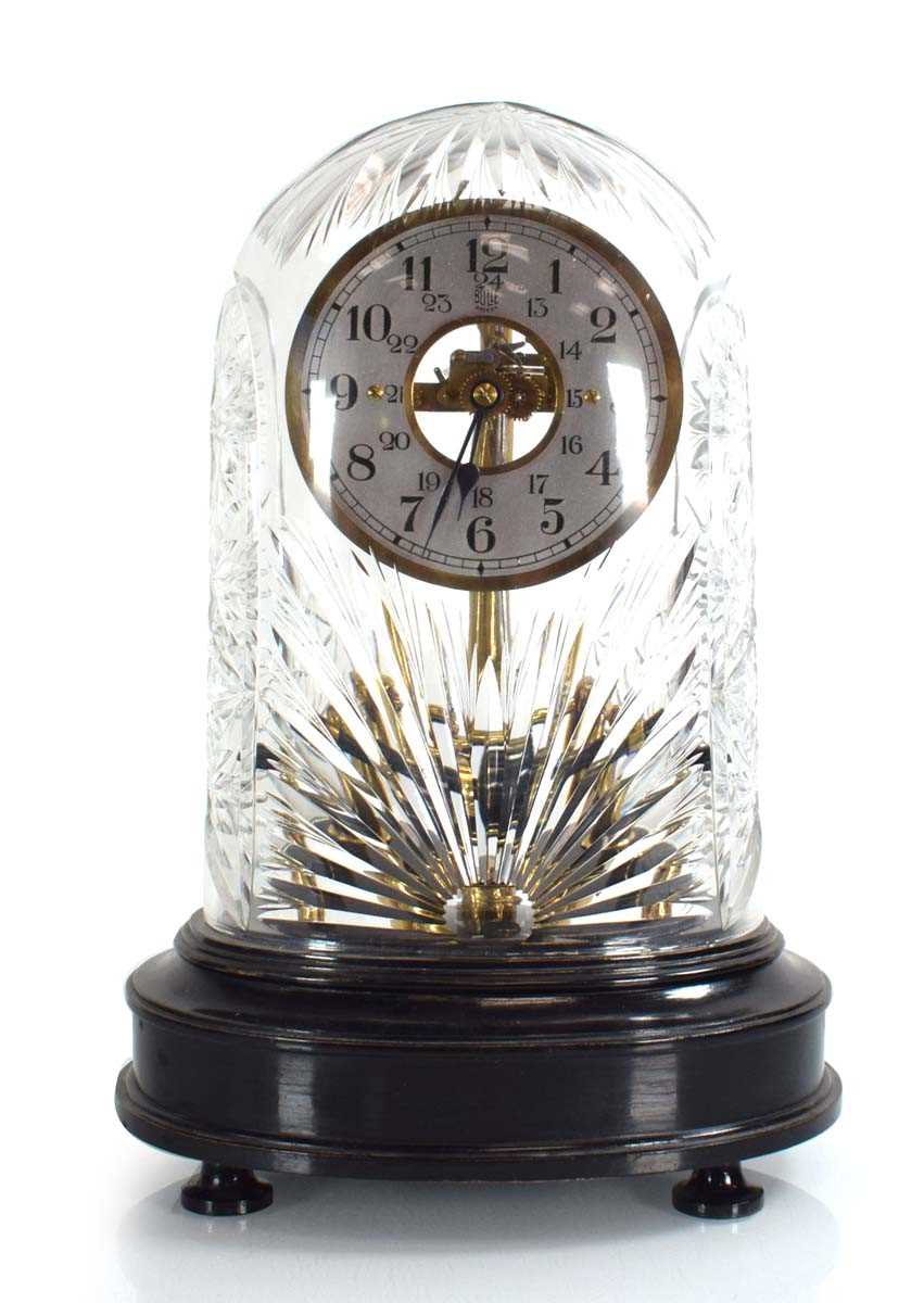 Lot 36 - A French electric clock, the silvered dial...