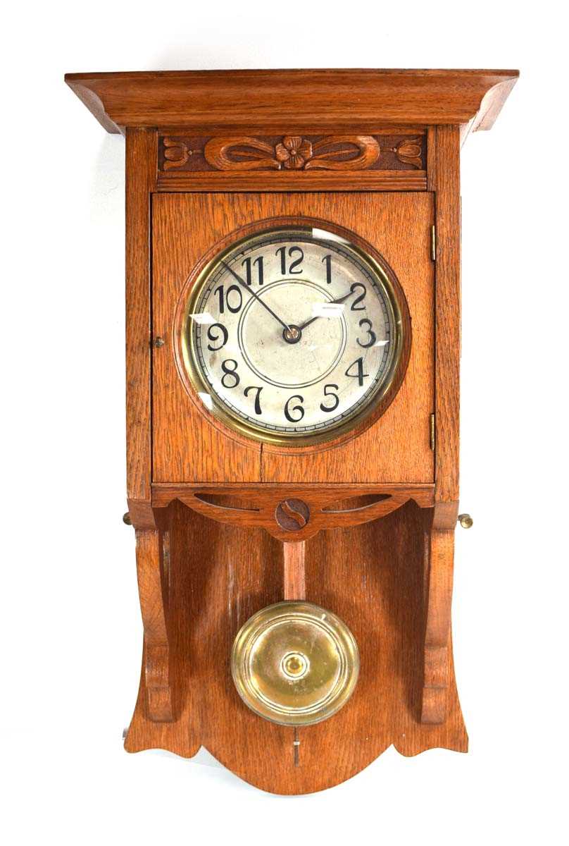 Lot 40 - A 'Commercial Arts & Crafts' wall clock with...