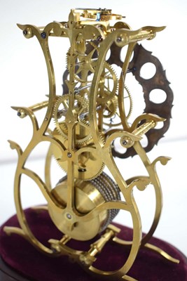 Lot 43 - A 19th century brass skeleton clock, the...