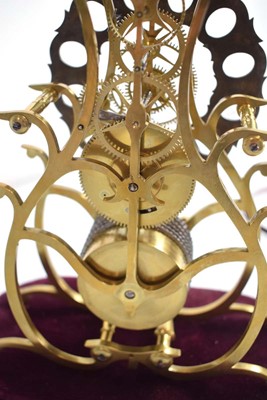 Lot 43 - A 19th century brass skeleton clock, the...