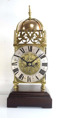 Lot 79 - An early 20th century brass lantern clock with...