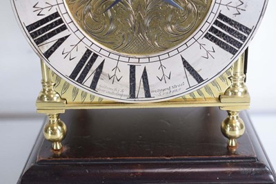 Lot 79 - An early 20th century brass lantern clock with...