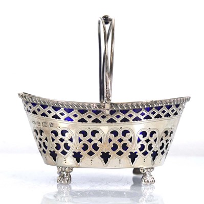 Lot 306 - An Edwardian pierced silver sugar basket with...