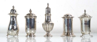 Lot 313 - A silver pepper of canted cylindrical form,...