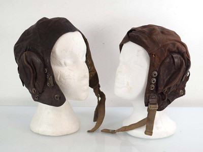 Lot 109 - Two Second World War RAF leather flying hats,...