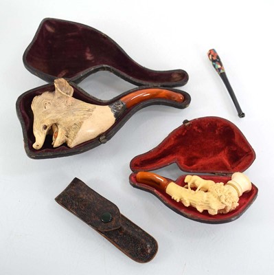 Lot 115 - A cased meerschaum, amber and metalwares...