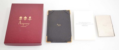 Lot 128 - A boxed Asprey jotter with JG monogram to the...