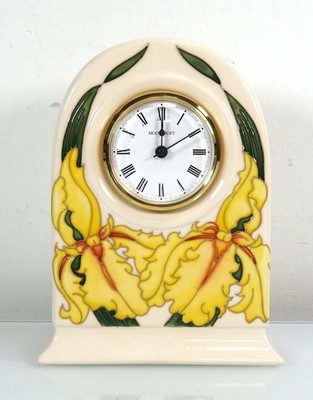 Lot 292 - A Moorcroft mantel timepiece of arched form...