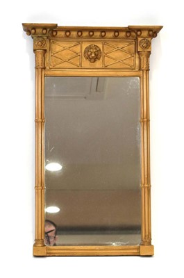 Lot 25 - A gilt framed wall mirror surmounted by...