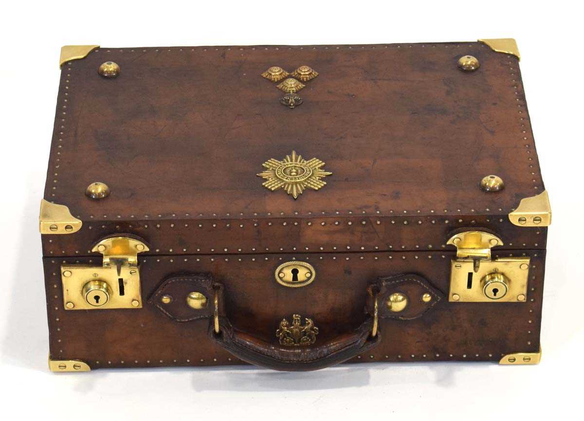 Lot 20 - A leather on oak dispatch case with brass...